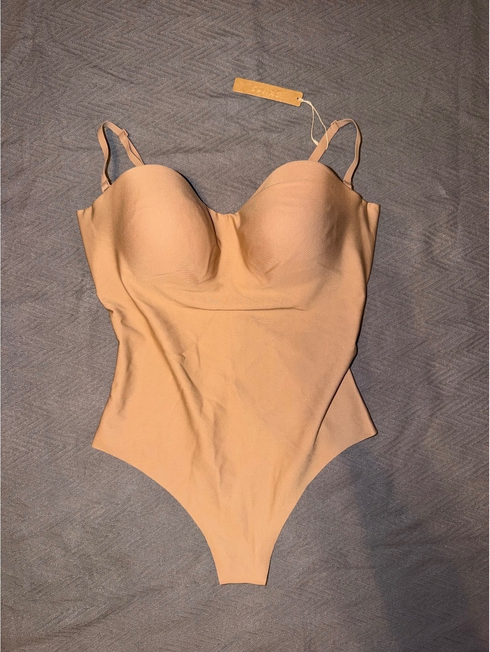 SKIMS Nude Shapewear Bodysuit with Adjustable Straps and Snap Closure